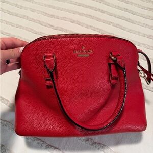 kate spade red pebbled leather satchel with gold logo